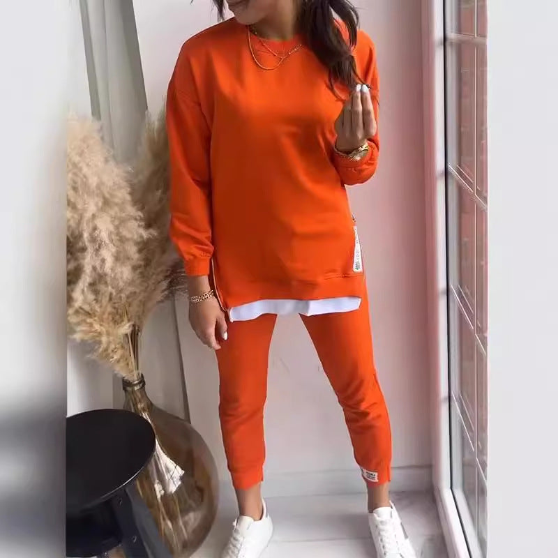 Mjukisset dam med sweatshirt med slits och smala byxor