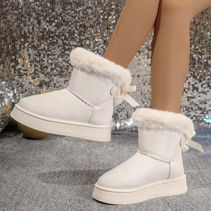 Emma | Snowboots dam i mocka med rosett, fuskpäls och halkfri sula