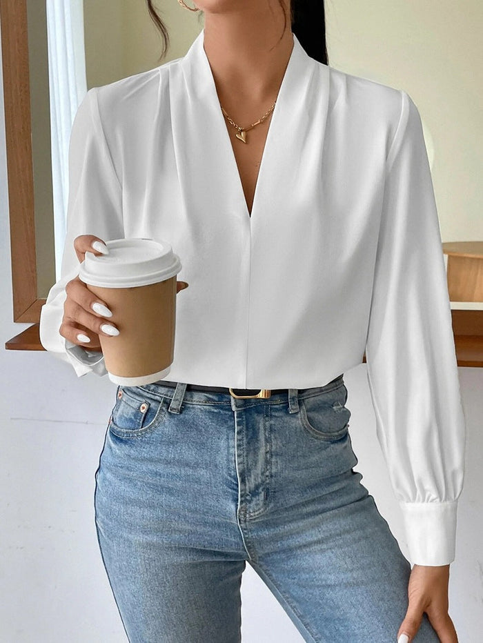 Dam V-ringad Blus med Puffärm och Omlottlook