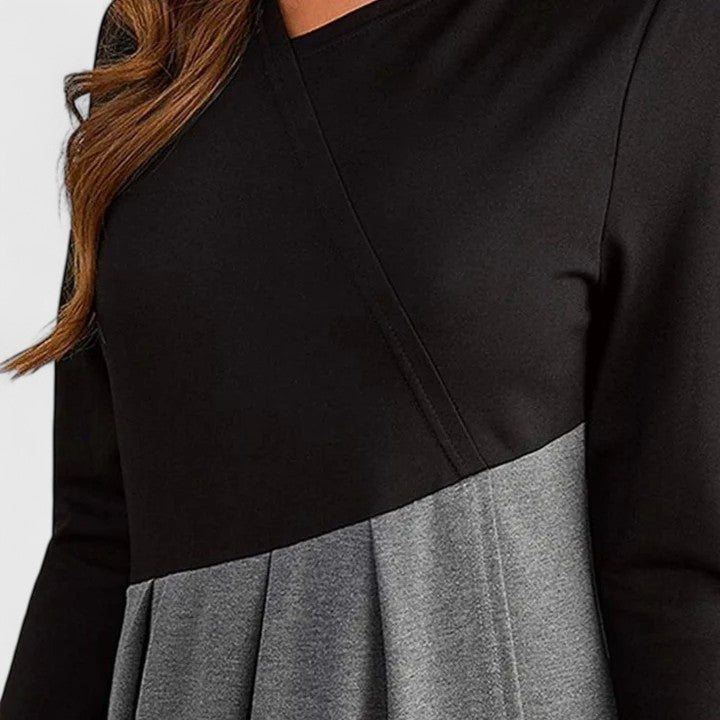 Nora | Figursmickrande Klänning med Eleganta Detaljer